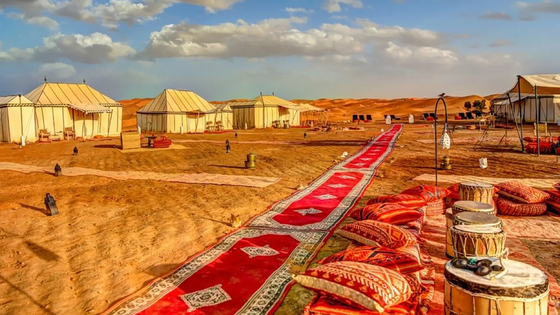 Luxury desert tent beneath a starlit sky at Desert Luxury Camp in Morocco.